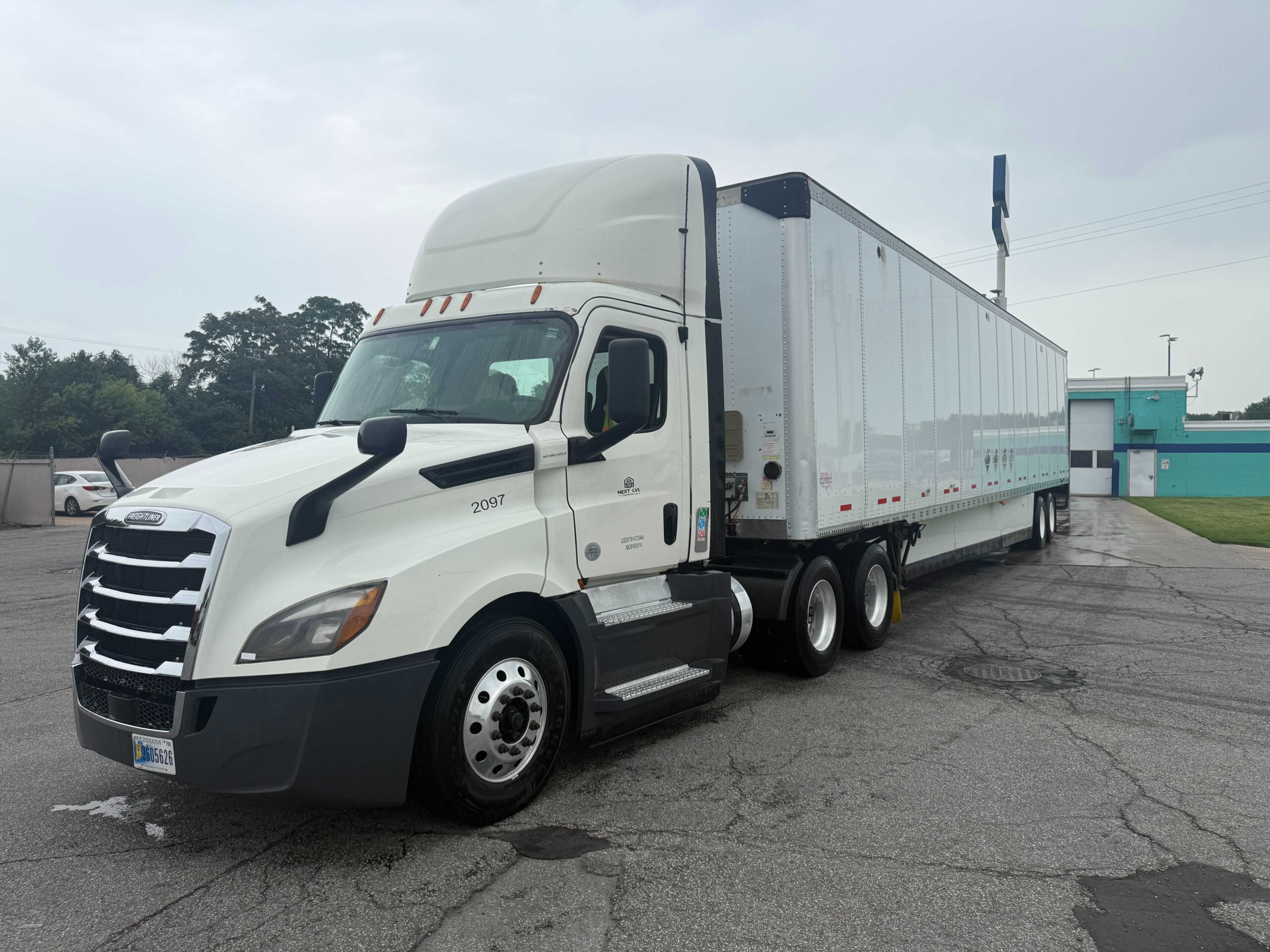 Next LVL Logistics truck and trailer